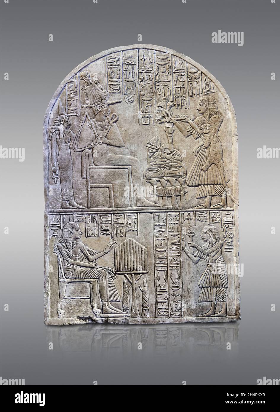 Ancient Egyptian stele of priest Iouny, 1069-665 BC, 3rd Intermediate period, limestone . The Louvre Museum inv C89. In the top register Iouny makes a Stock Photo
