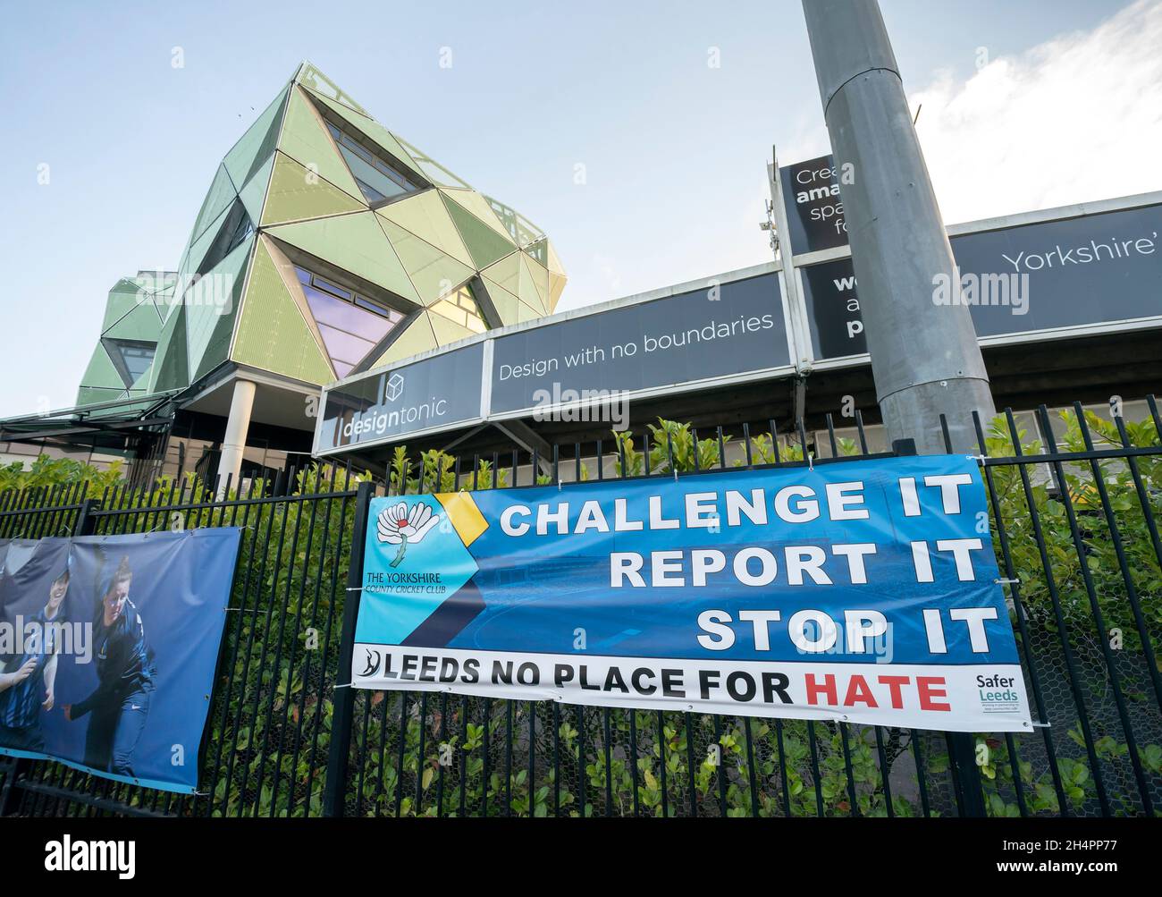 A Yorkshire County Cricket Club sign that reads 'Challenge it. Report it. Stop it. Leeds no place for hate' outside Yorkshire County Cricket Club's Headingley Stadium in Leeds. The club is facing mounting pressure from concerned politicians and departing sponsors after former England batter Gary Ballance has confessed to using 'a racial slur' against his ex-Yorkshire team-mate Azeem Rafiq. Picture date: Thursday November 4, 2021. Stock Photo