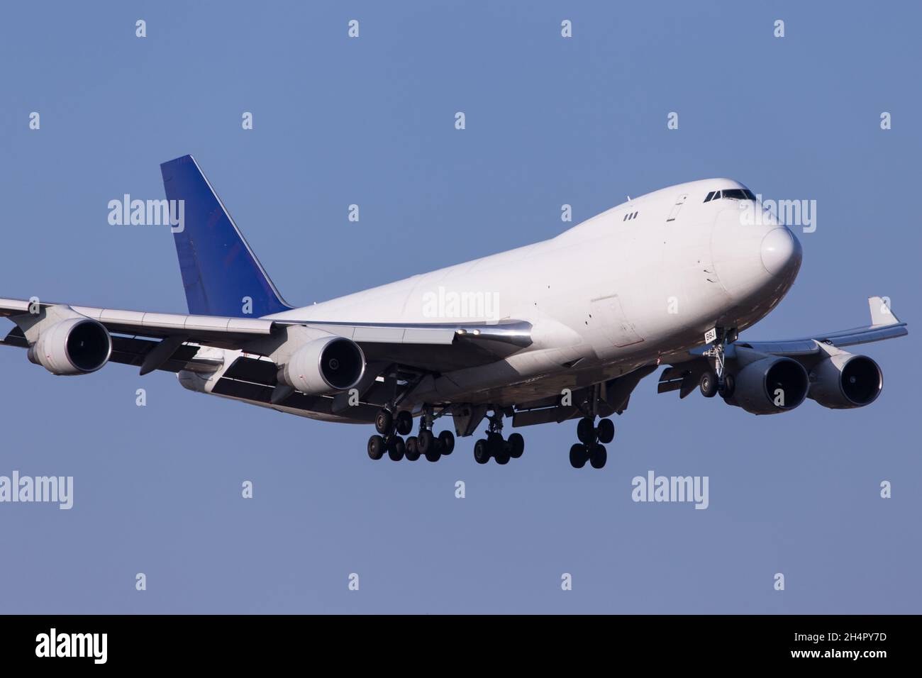 Aerotranscargo Boeing 747-400 cargo airplane landing Stock Photo