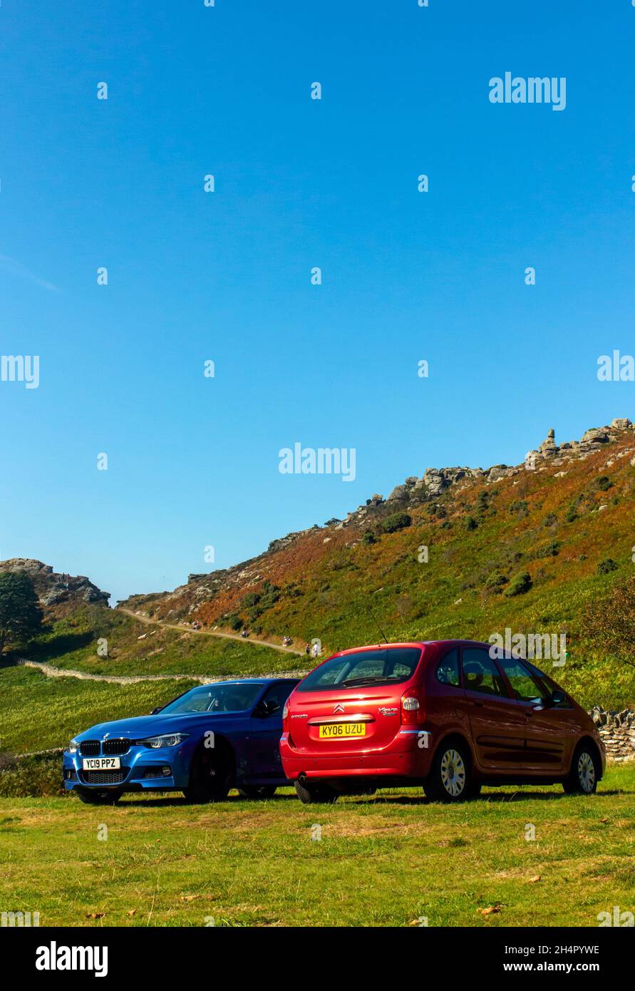 Cars parked at The Valley of Rocks a popular beauty spot near Lynmouth in Exmoor National Park North Devon England UK Stock Photo