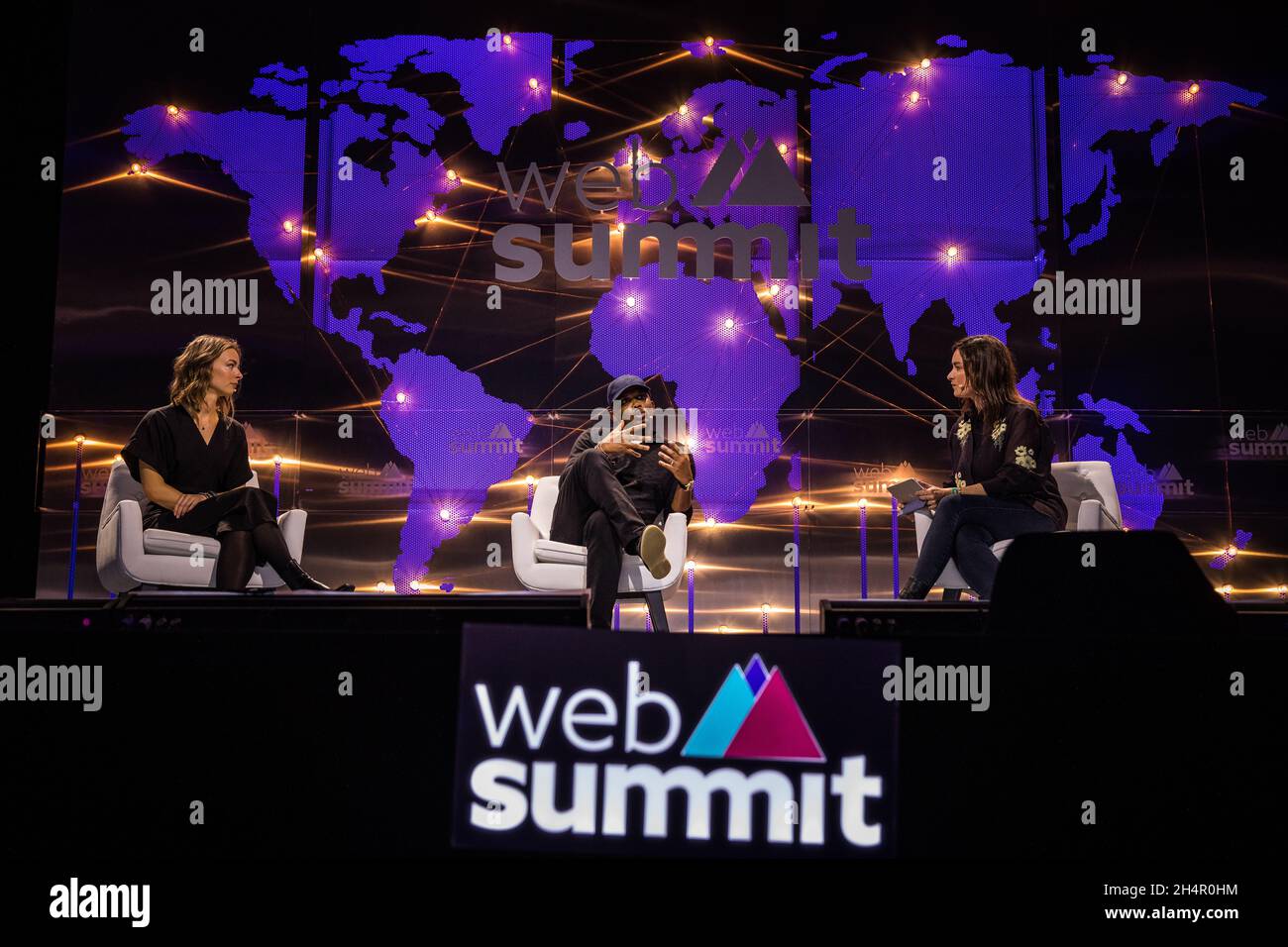 Lisbon, Portugal. 03rd Nov, 2021. Sophia Farrar (L), Strategy Advisor of UNICEF, Samuel Eto'o (C) Footballer and Philanthropist at The Samuel Eto'o Foundation and Marjorie Paillon (R), Presenter at France 24, seen on stage, during day three of the Web Summit at Parque das Nacoes in Lisbon. Credit: SOPA Images Limited/Alamy Live News Stock Photo