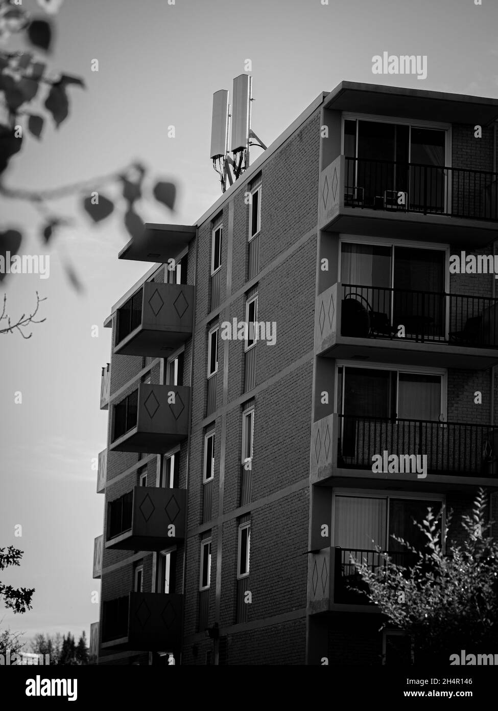 Black and white shot of an apartment building in Calgary, Alberta Stock Photo