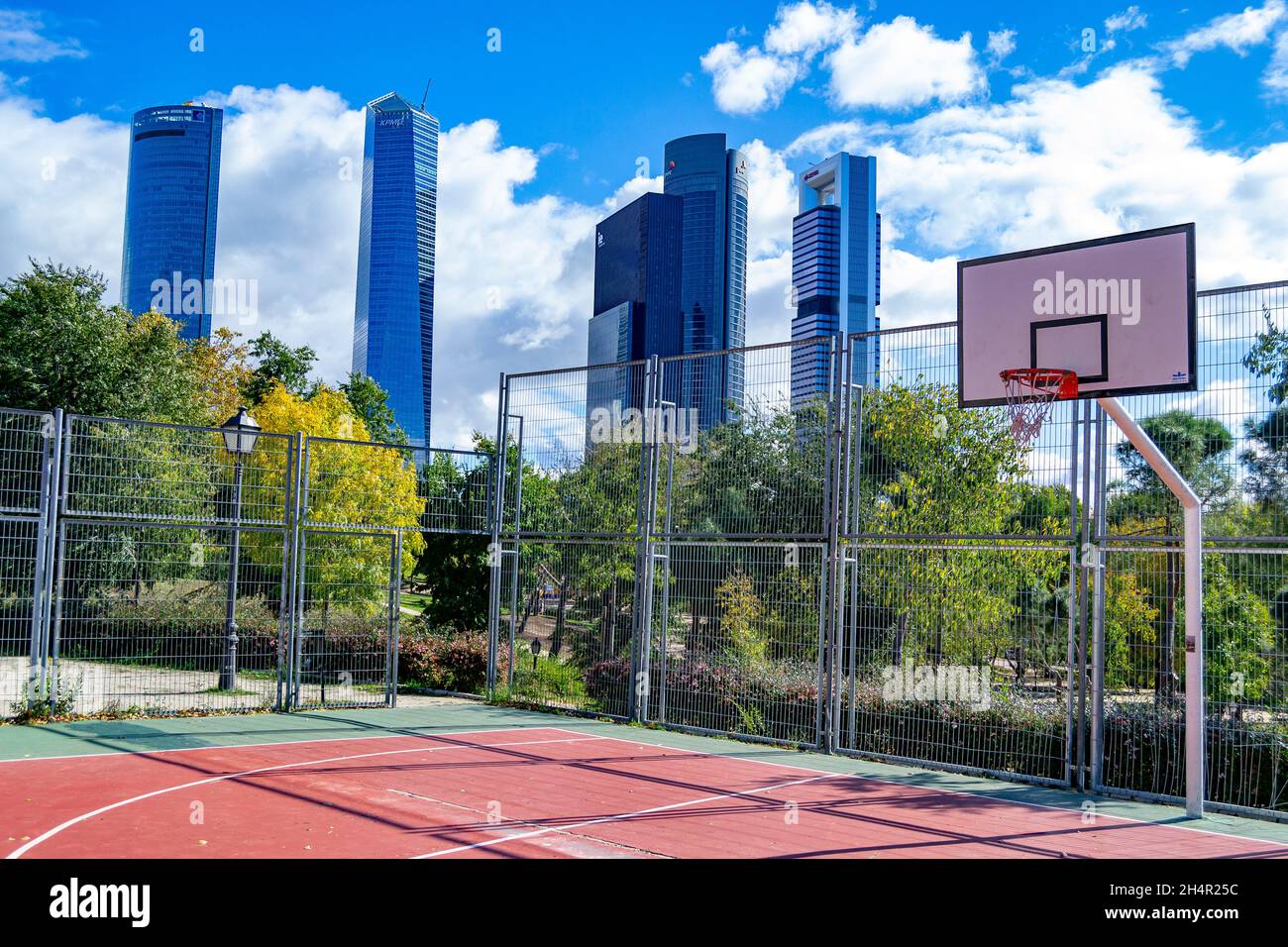 Basketball court with the 5 skyscrapers of the city of Madrid, in Spain. Europe. Horizontal
