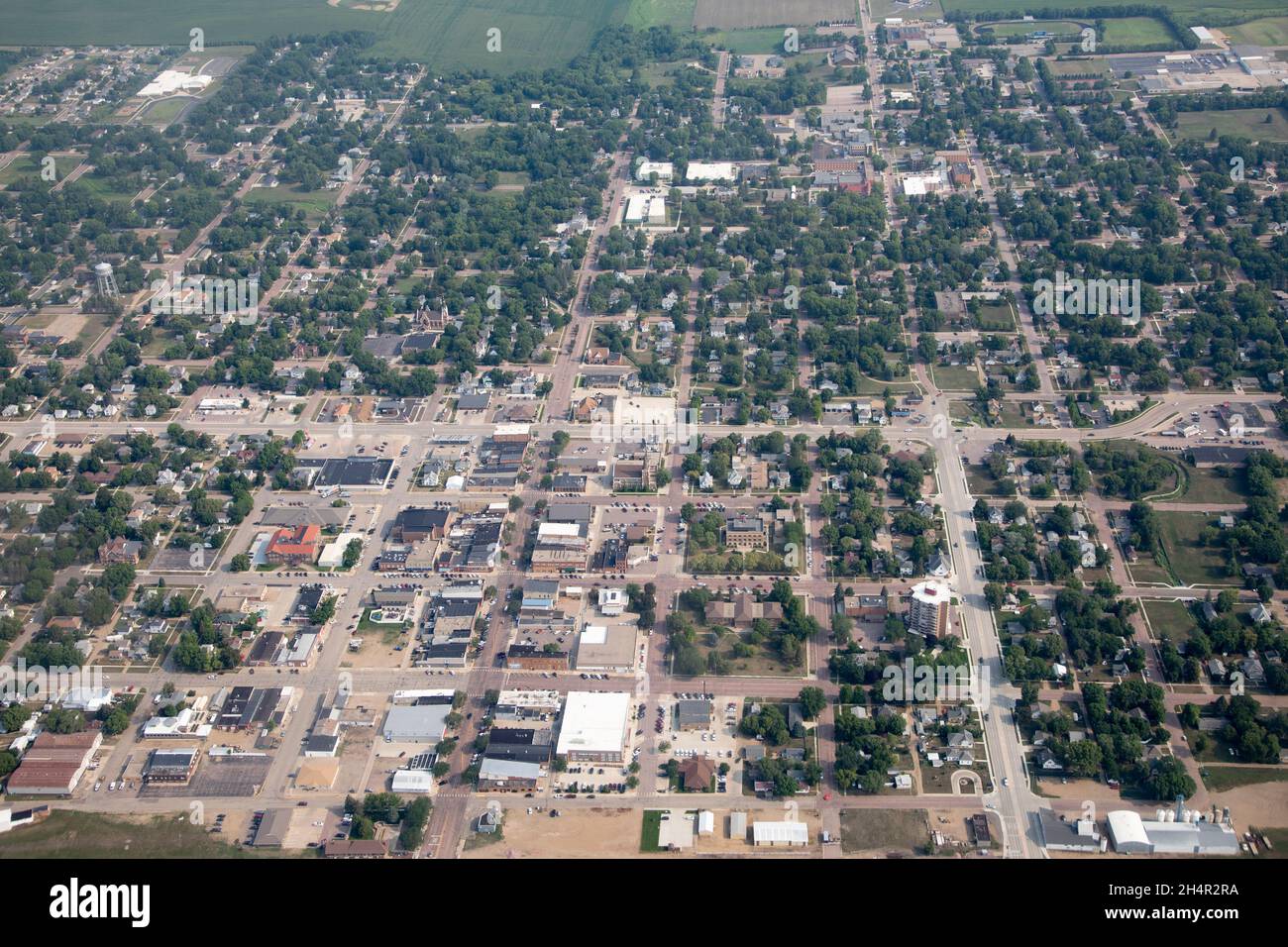 High aerial view of small farming town of Madison, South Dakota with