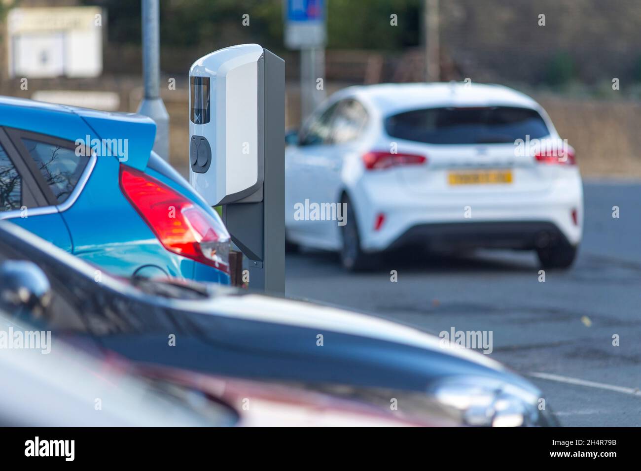 Electric vehicle charging points in a public car park in the West