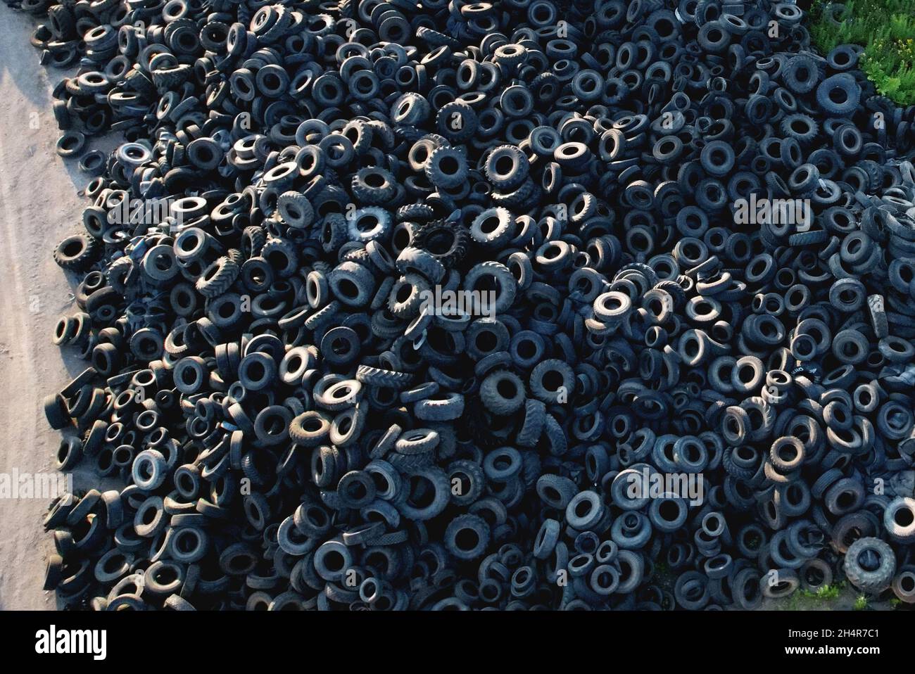 Landfill with old tires and tyres for recycling. Reuse of the waste