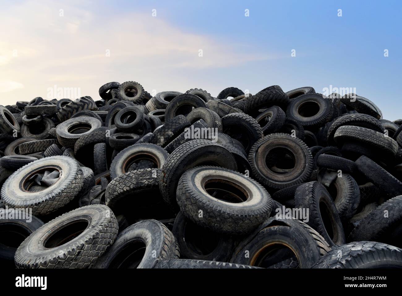 Landfill with old tires and tyres for recycling. Reuse of the waste