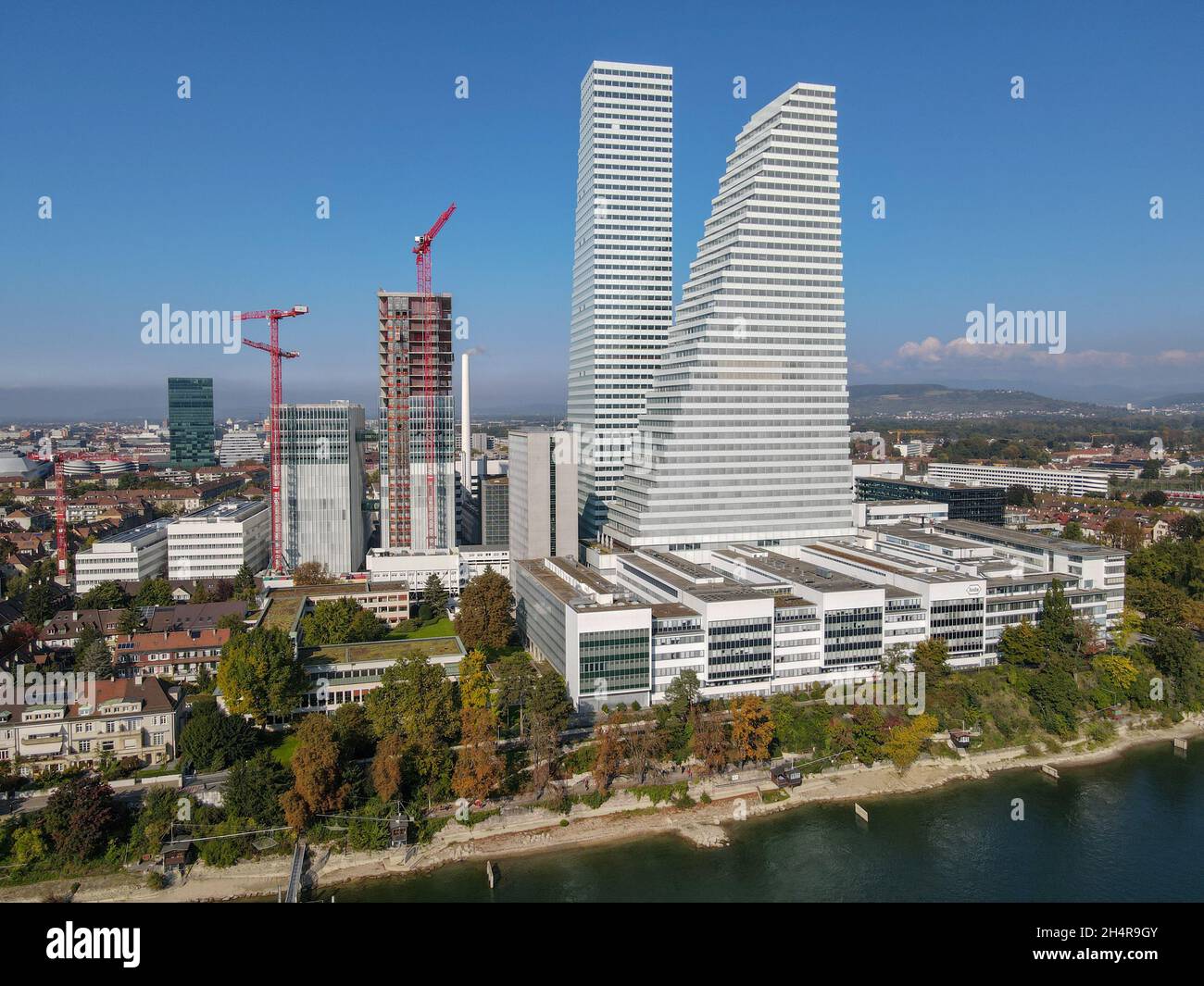 Basel, Switzerland - 17 September 2021: Drone view at the Roche industry towers at Basel on Switzerland Stock Photo