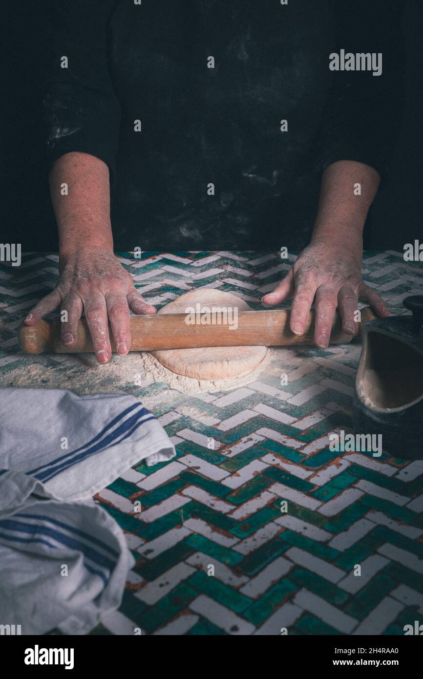 Old woman making pasta Stock Photo - Alamy