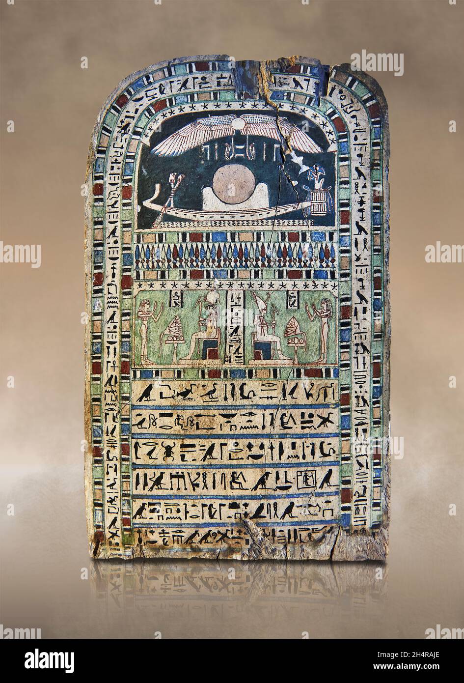 Ancient Egyptian stele of adoration to Atoum & Ra-Horakhty, 554-525 BC, 16th dynasty.  Louvre Museum N3787. 1st register; sign of the starry sky; wing Stock Photo