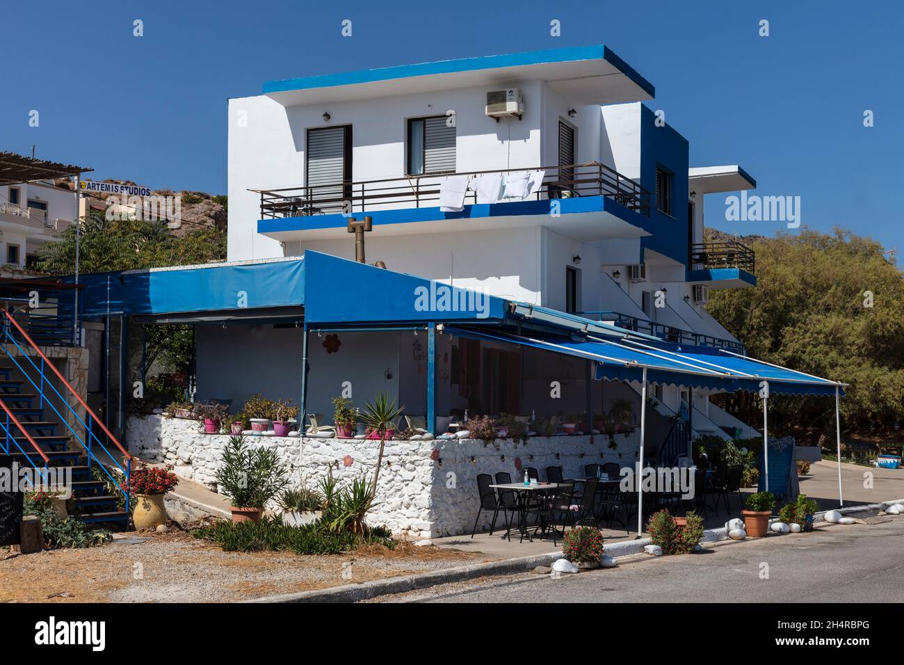 Greek tavern in a small village Paleochora on the southwest coast of Crete, Greece Stock Photo