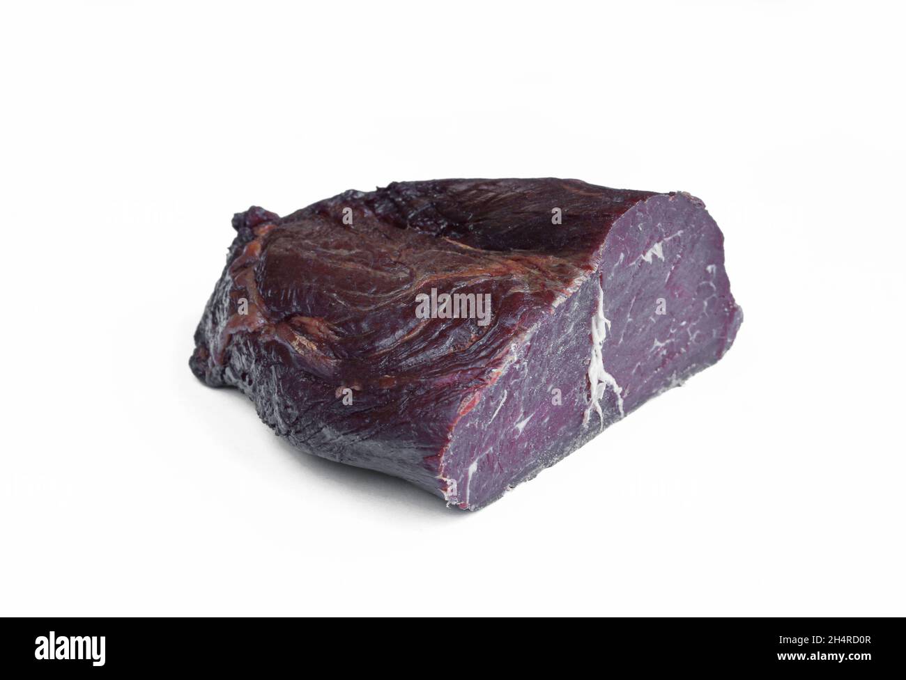Piece of dried beef meat isolated on white background Stock Photo Alamy
