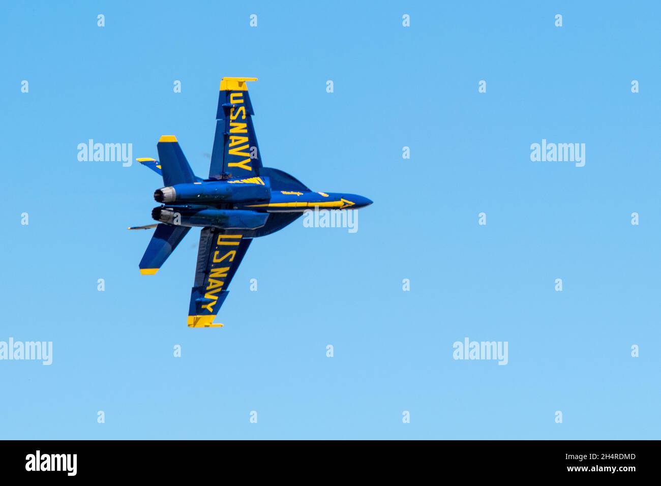 Flying aircraft against a blue sky during an airshow Stock Photo - Alamy