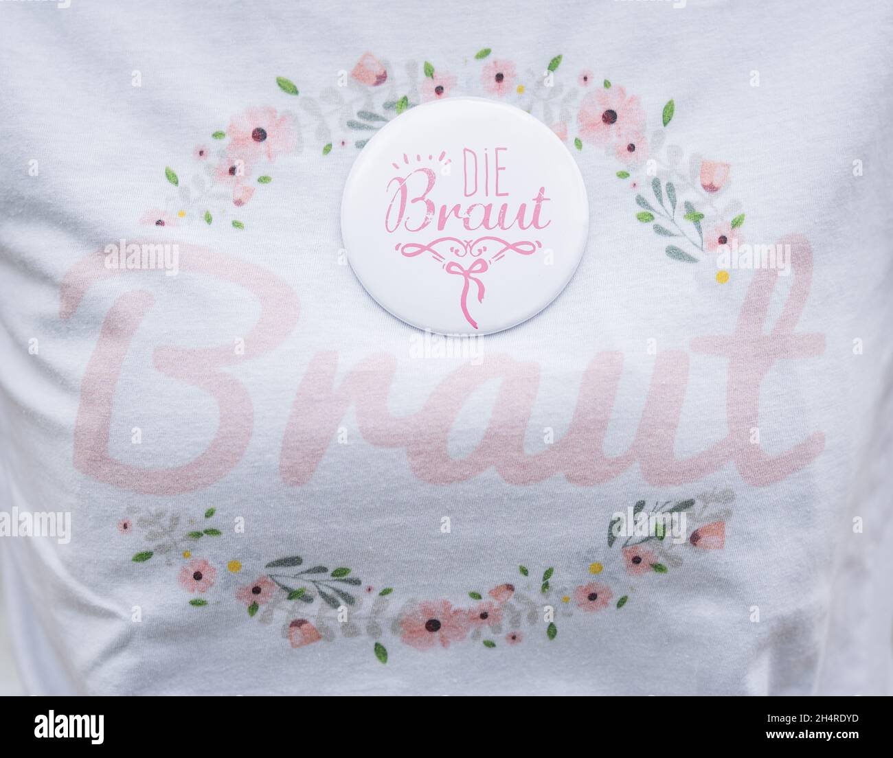 Rottweil, Germany. 02nd Aug, 2020. A woman wears a T-shirt with the inscription 'Bride' and a button with the inscription 'The Bride' at her bachelor party. Credit: Silas Stein/dpa/Alamy Live News Stock Photo