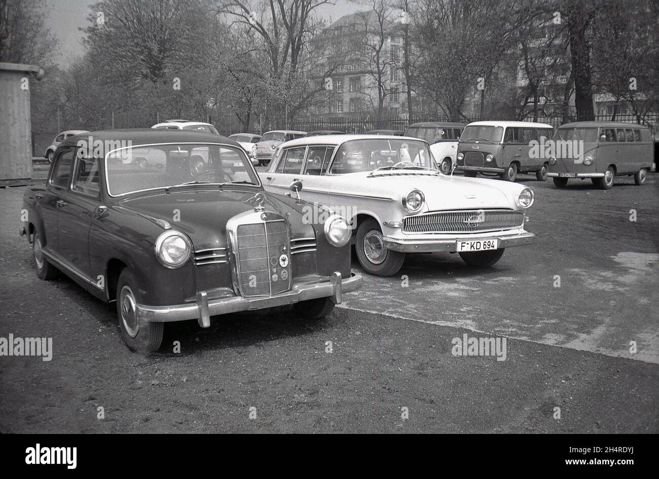 1960s, historical, cars in a second-hand car lot, Germany, including a Mercedes, Opel and VW camper van, Stock Photo