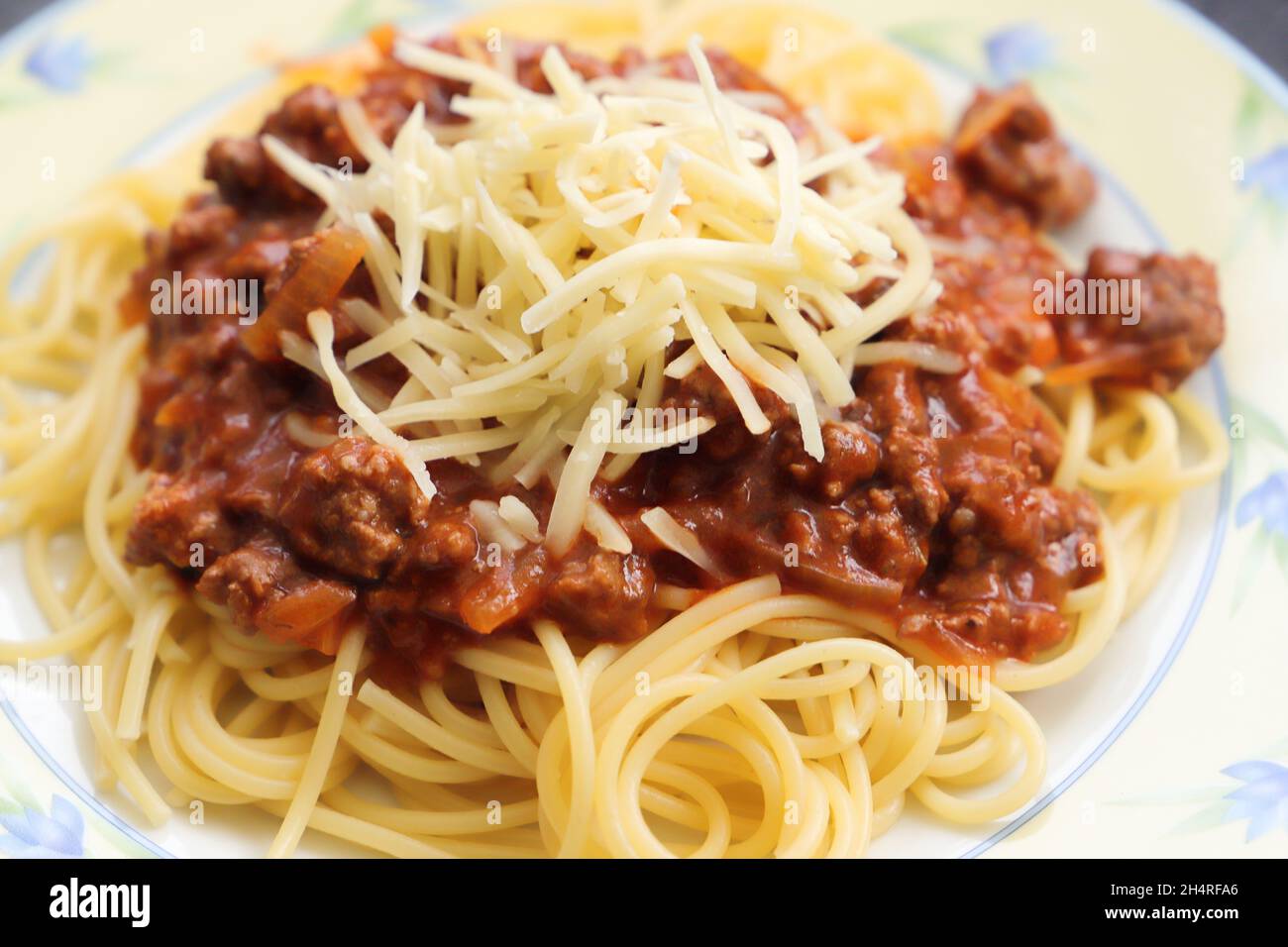 spaghetti-with-bolognese-sauce-and-cheese-stock-photo-alamy