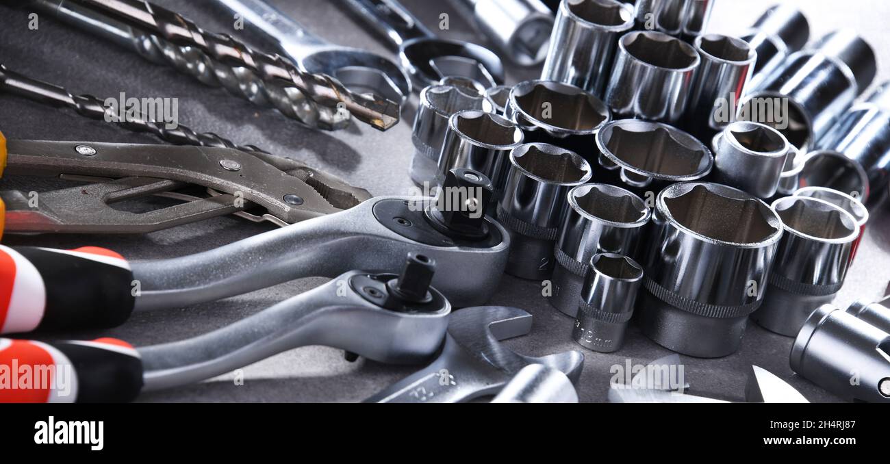 Composition with a variety of metal tools Stock Photo - Alamy