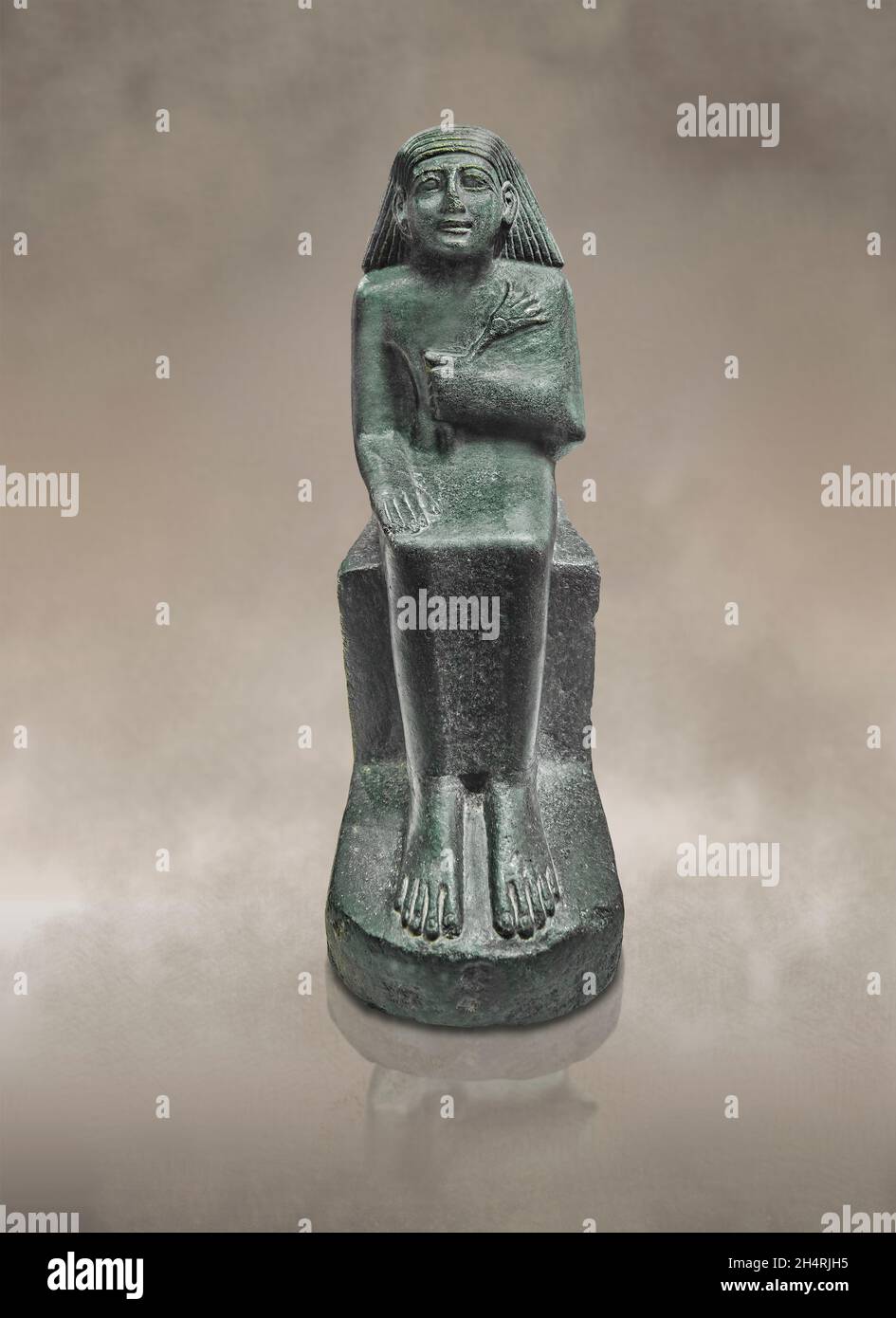 Egyptian statue sculpture of a man holding a flower, circa 1479 BC