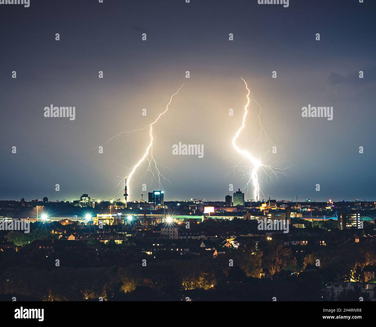 Lightning strike in a city Stock Photo