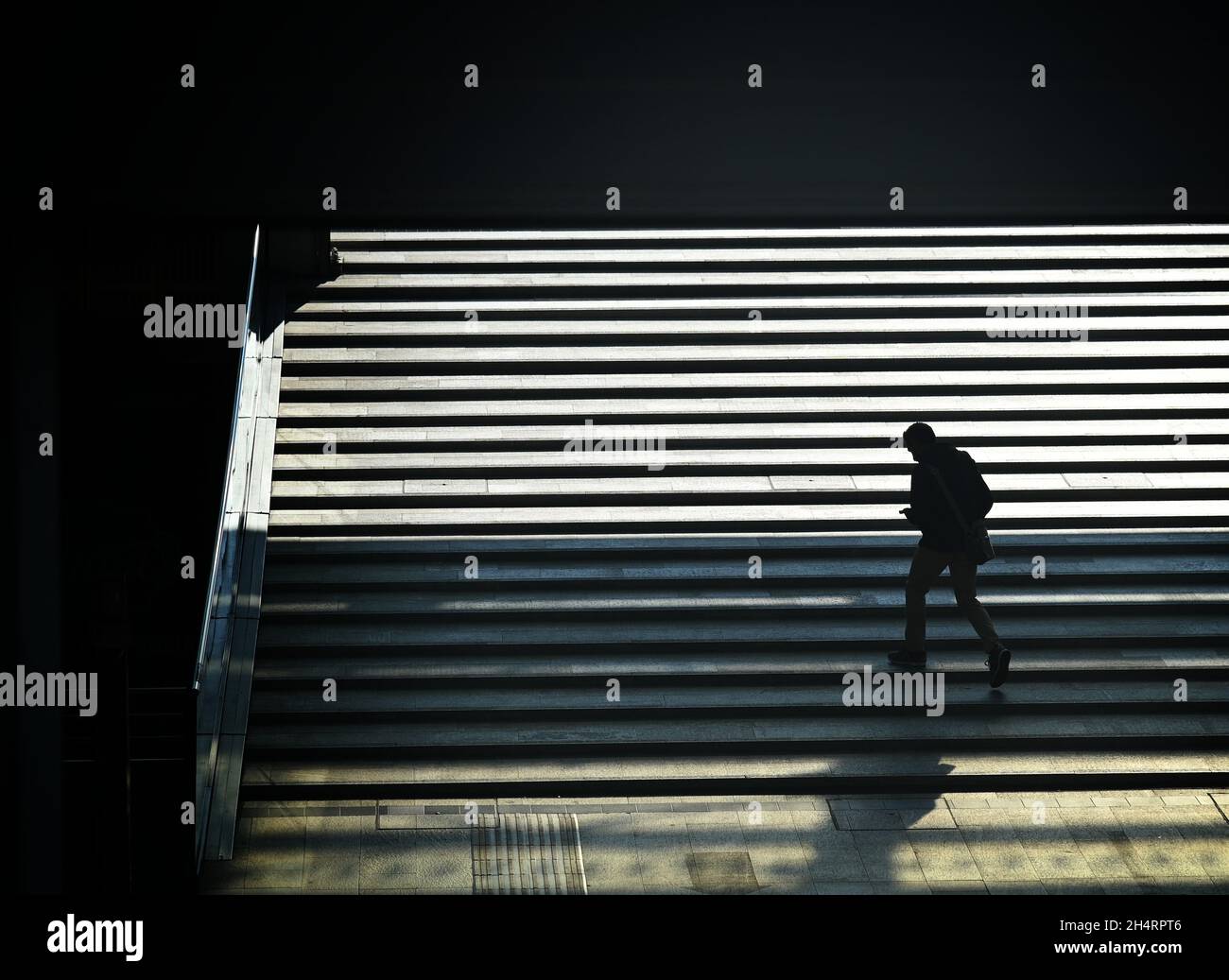 High angle view of a human silhouette exiting from the underpass Stock ...