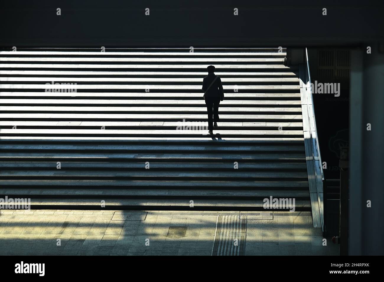 High angle view of a human silhouette exiting from the underpass Stock ...