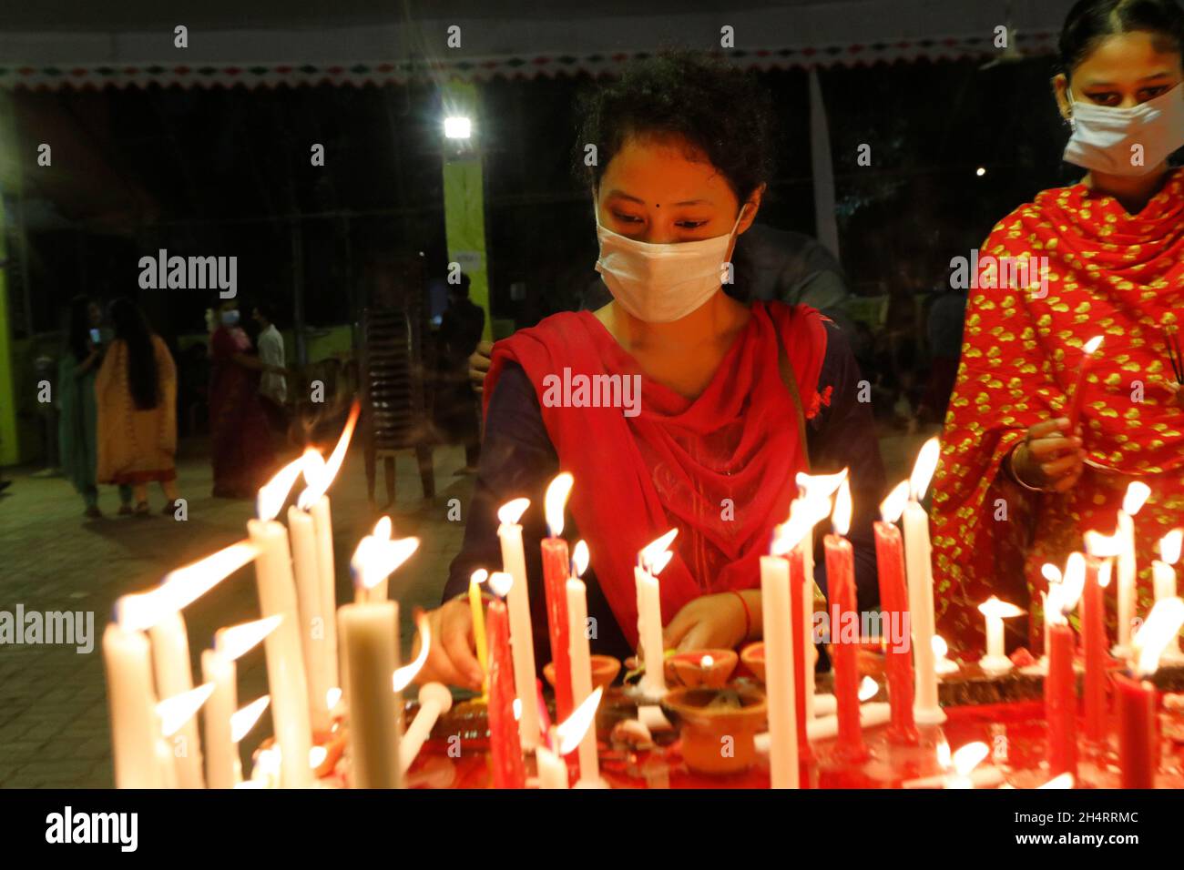 NOVEMBER04,2021,DHAKABANGLADESH Devotees seen lighting candles as