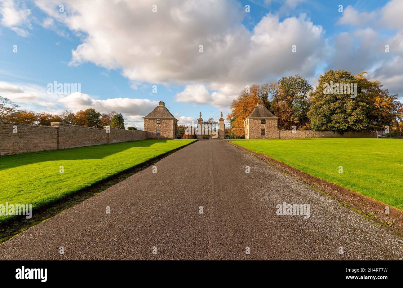Gatehouse and driveway for Floors Castle in Kelso, Scottish Borders, Scotland, UK Stock Photo