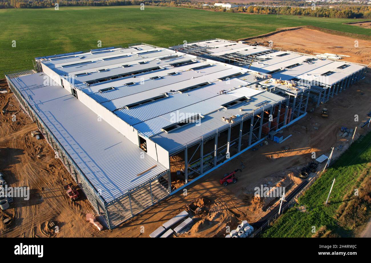 Warehouse Construction from metal structure. Industrial building on