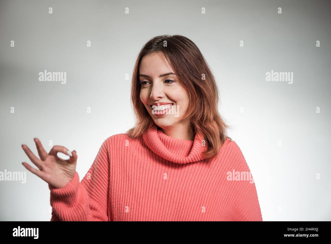 Woman in red sweater on hi-res stock photography and images - Alamy