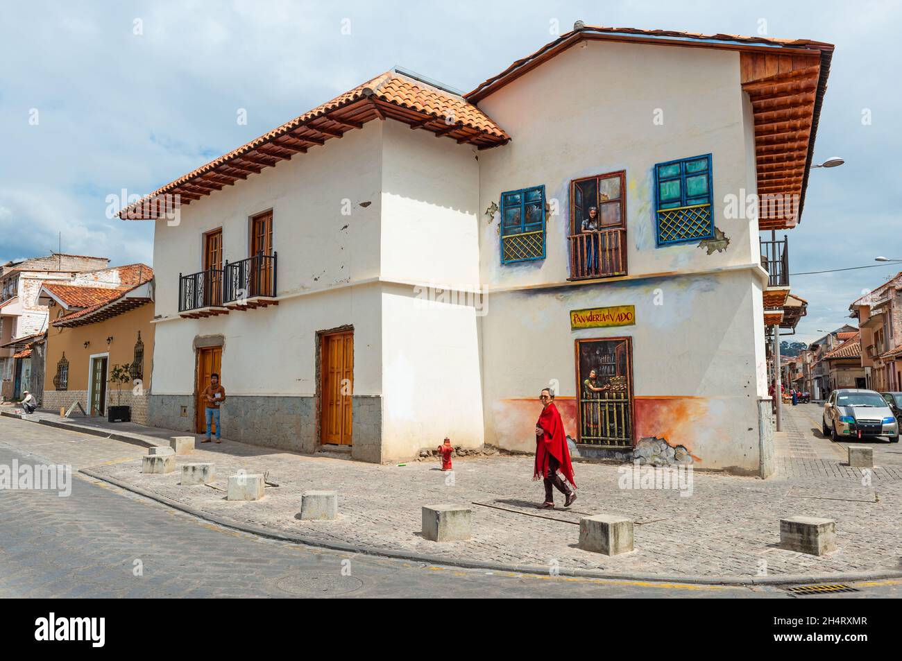 City life with ecuadorian people and colonial style architecture in Cuenca city, Ecuador. Stock Photo