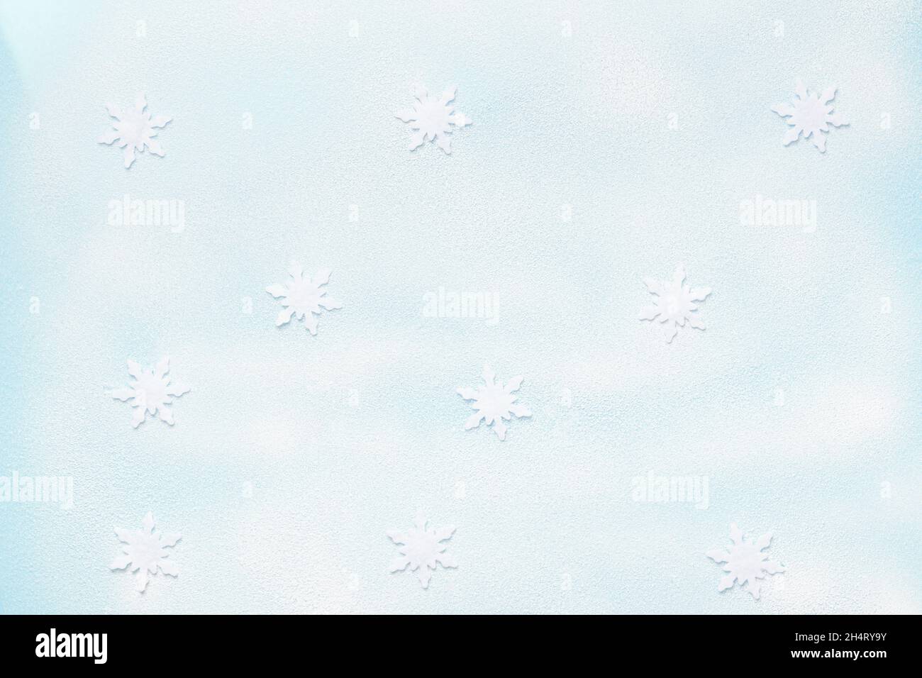 Winter new year snowy background. Composition with snowflake decorations. Stock Photo