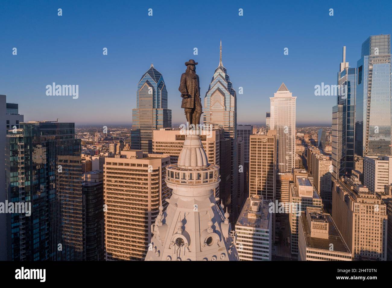 Statue of William Penn. Philadelphia City Hall. William Penn is a bronze statue by Alexander Milne Calder of William Penn. It is located atop the Phil Stock Photo