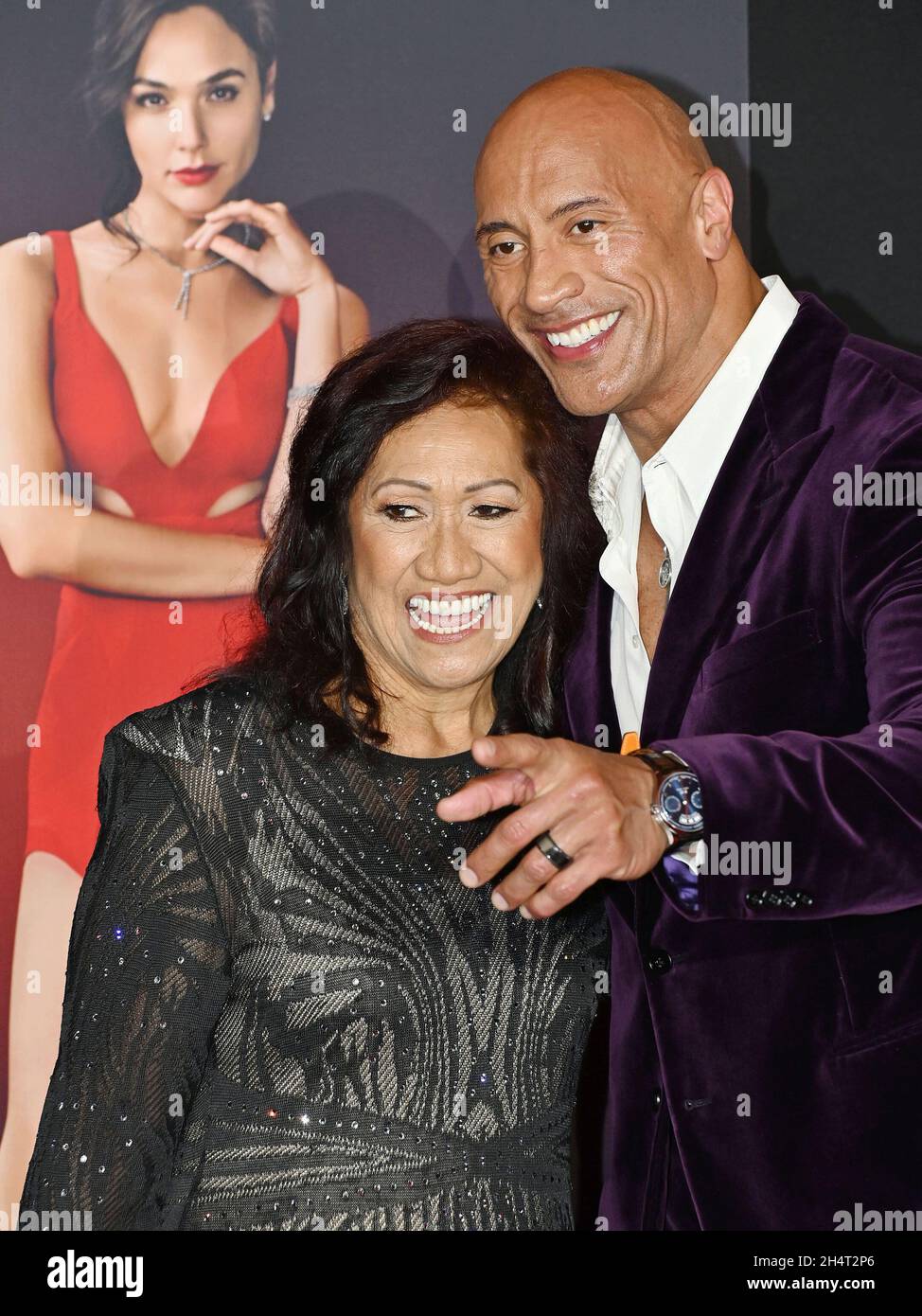 LOS ANGELES, CA - NOVEMBER 03: Ata Johnson (L) and Dwayne Johnson attend the World Premiere Of Netflix's 'Red Notice' at L.A. LIVE on November 03, 2021 in Los Angeles, California. Stock Photo