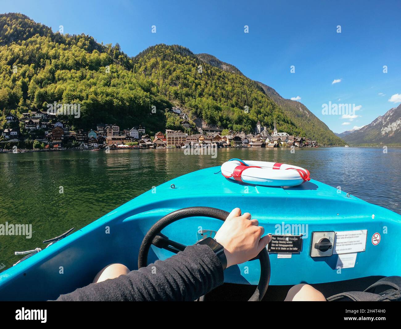 Man driving boat handsome hi-res stock photography and images - Alamy