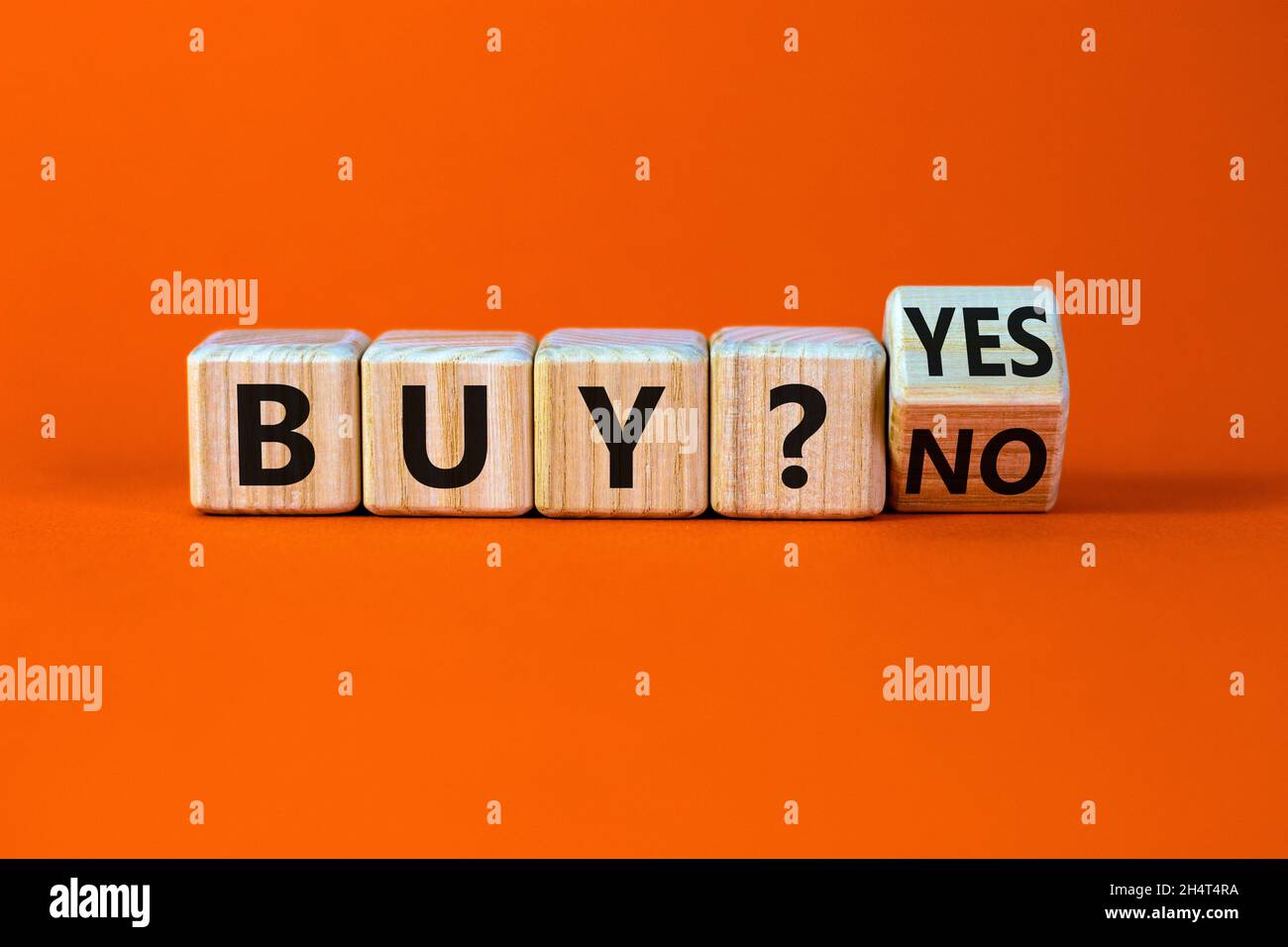 Waakzaam Typisch rijk Time to buy symbol. Turned a wooden cube and changed the words buy no to  buy yes. Beautiful orange table, orange background. Business and time to  buy Stock Photo - Alamy