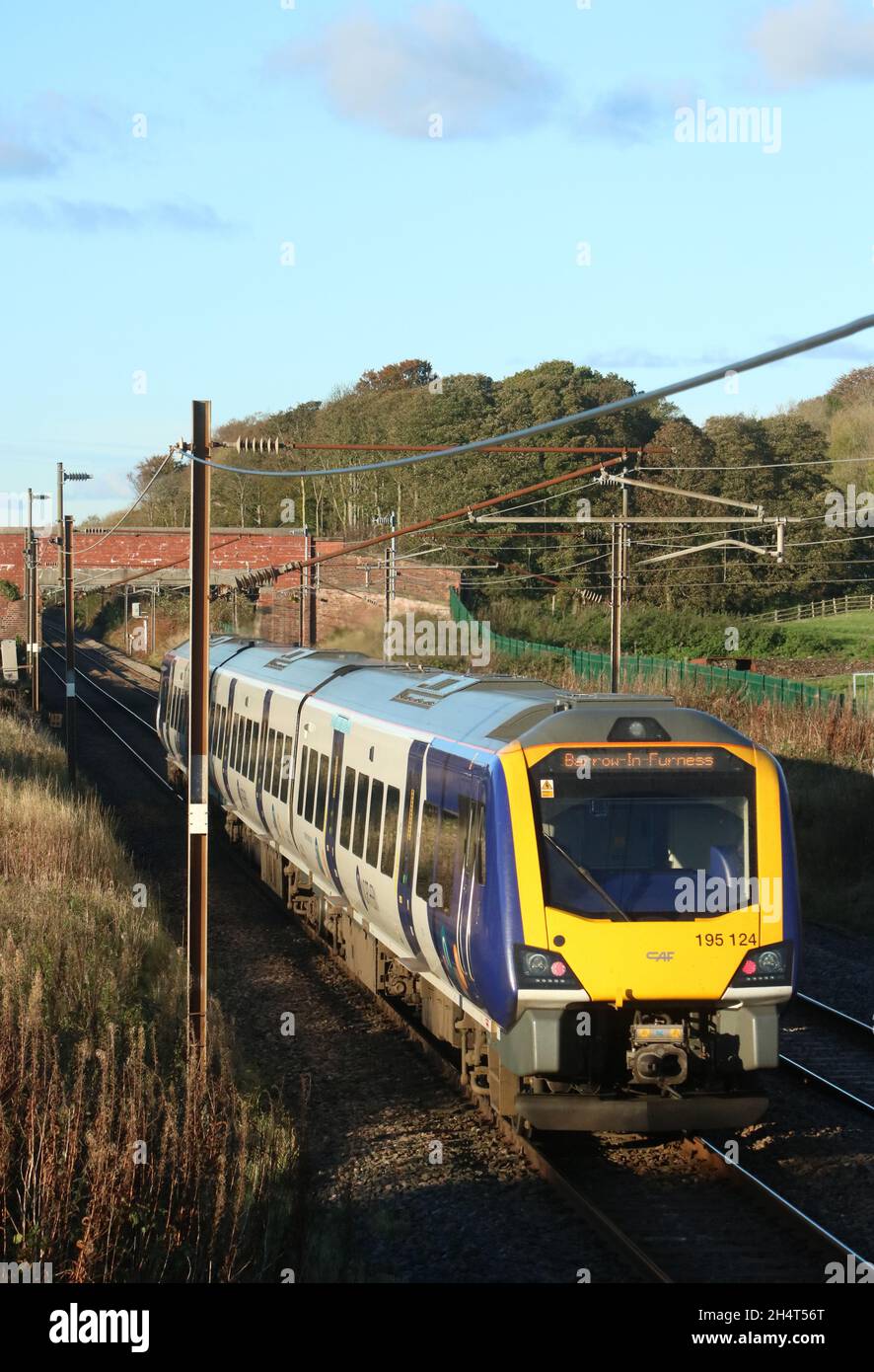 Northern civity dmu train, number 195 103, passing Woodacre near Garstang in Lancashire on the West Coast Main Line on Thursday 4th November. Stock Photo