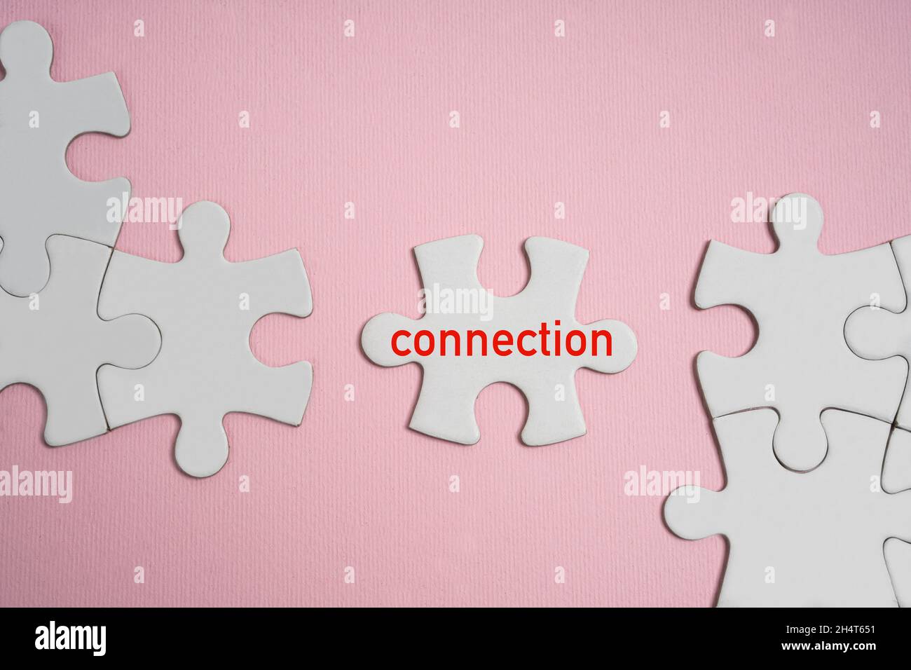 the concept of connection between puzzle pieces Stock Photo