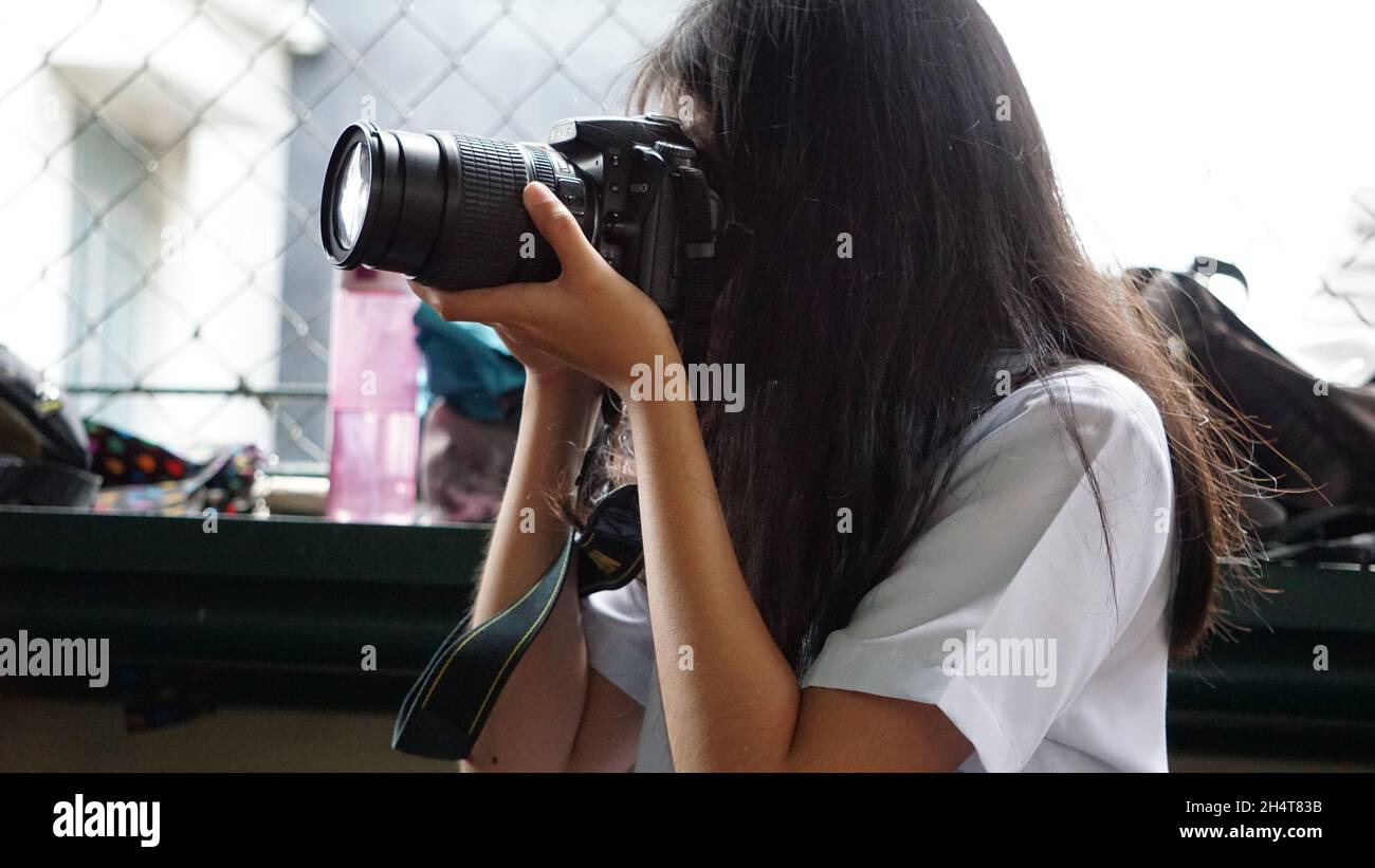 Fine arts student taking photographs Stock Photo