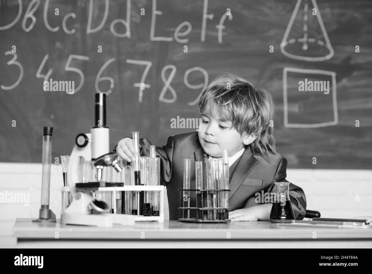 chemistry lab. Back to school. Little kid learning chemistry in school laboratory. kid in lab