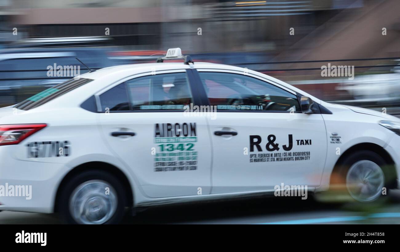 Panning shots of vehicles on the street of Espana, Manila Stock Photo