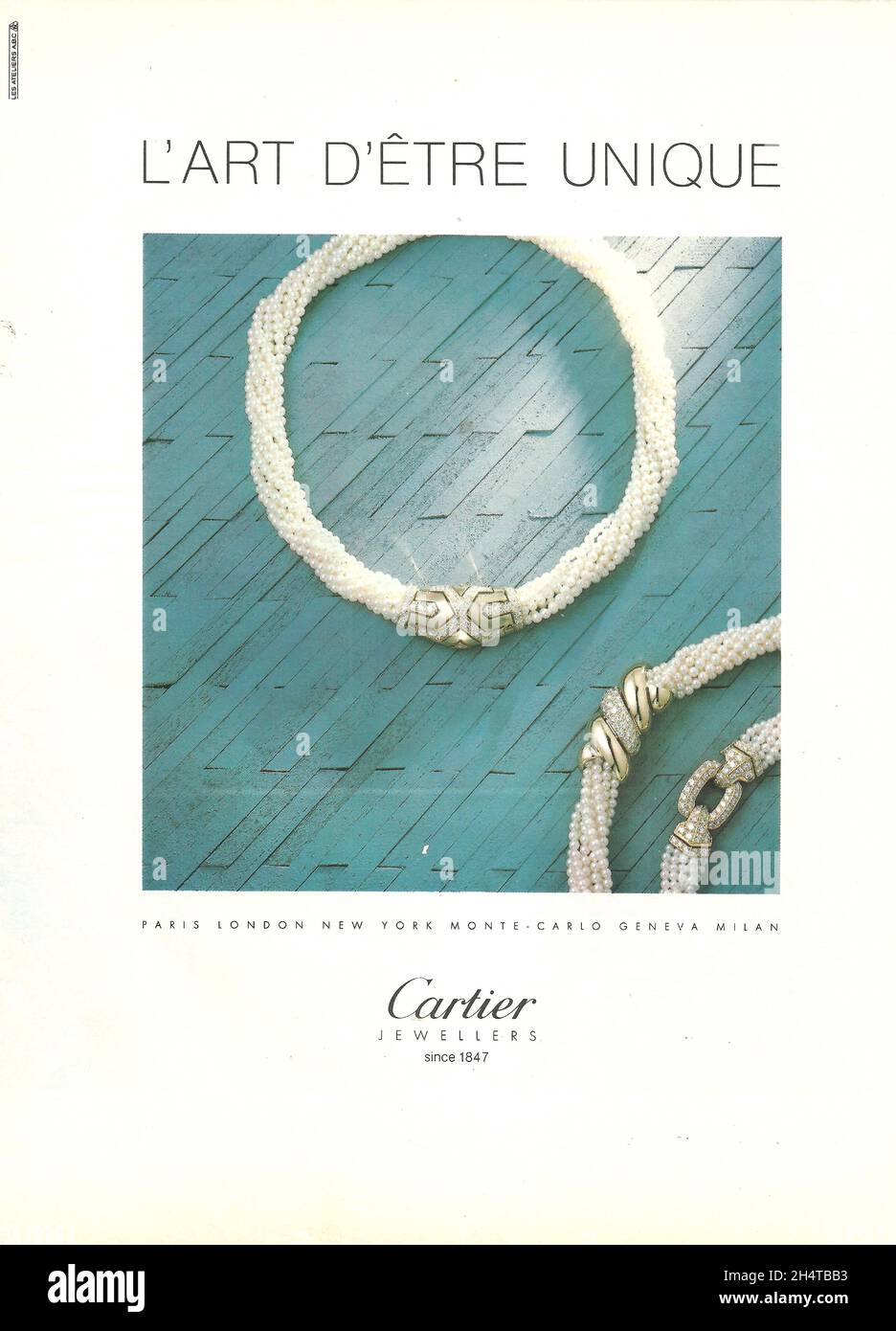 Cartier jewellery jewelry advertisement advert necklace necklet bracelet paper ad 1970s 1980s Stock Photo