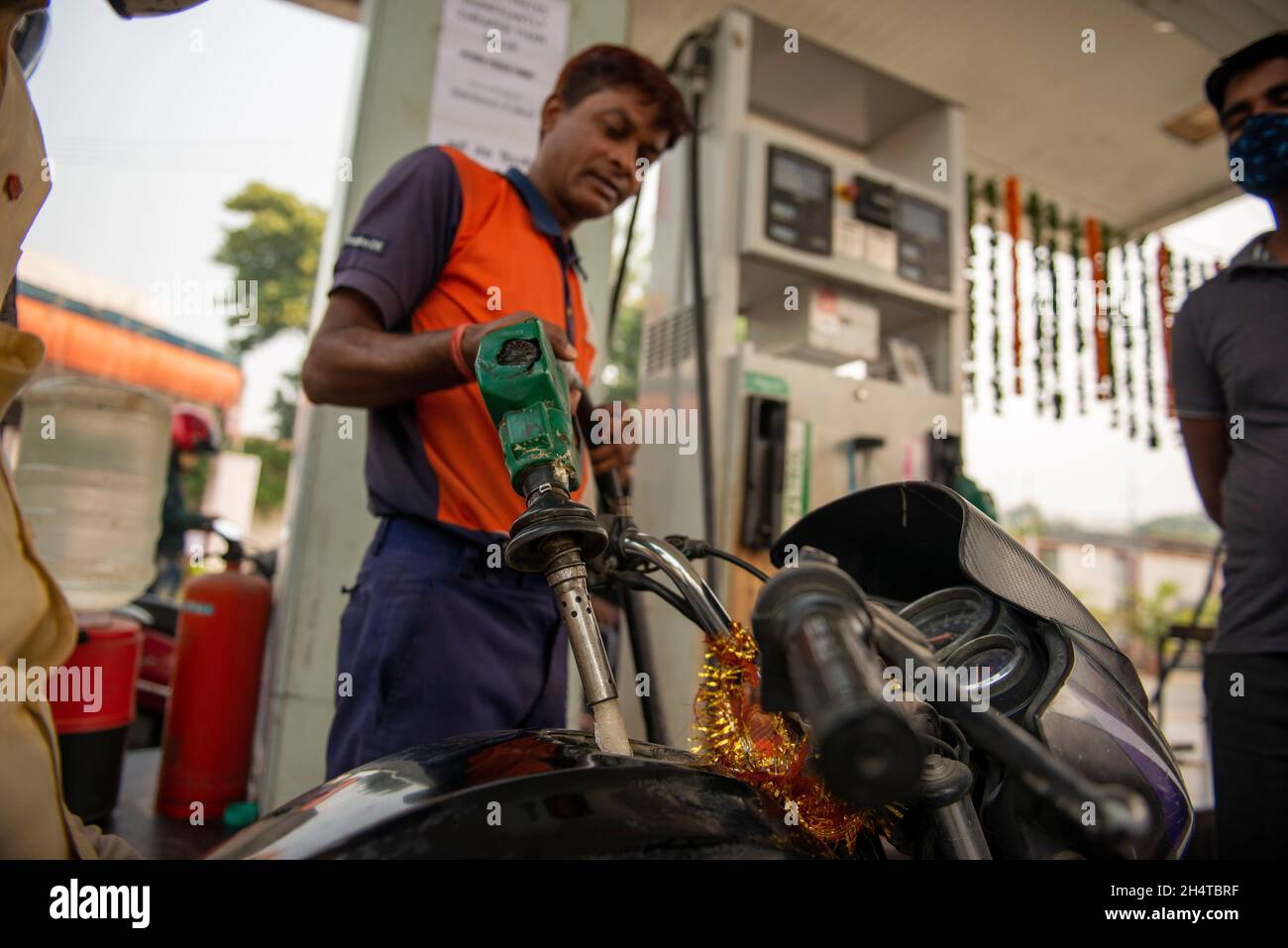 Petrol pump attendant hires stock photography and images Alamy