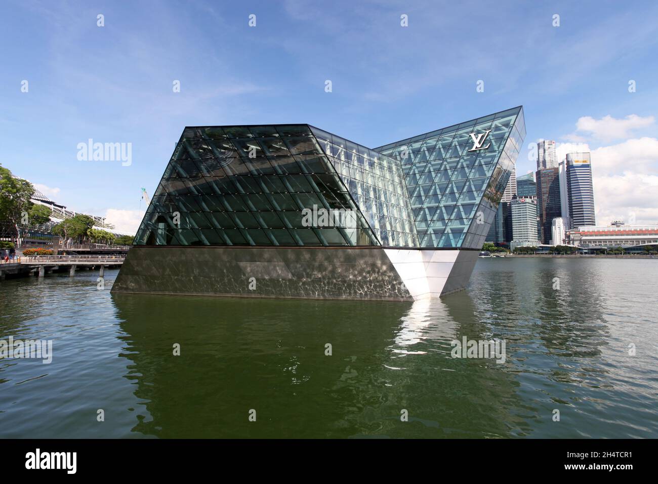 Louis Vuitton store in Singapore is a very modern glass design structure in  the Marina Bay Sands resort Stock Photo - Alamy
