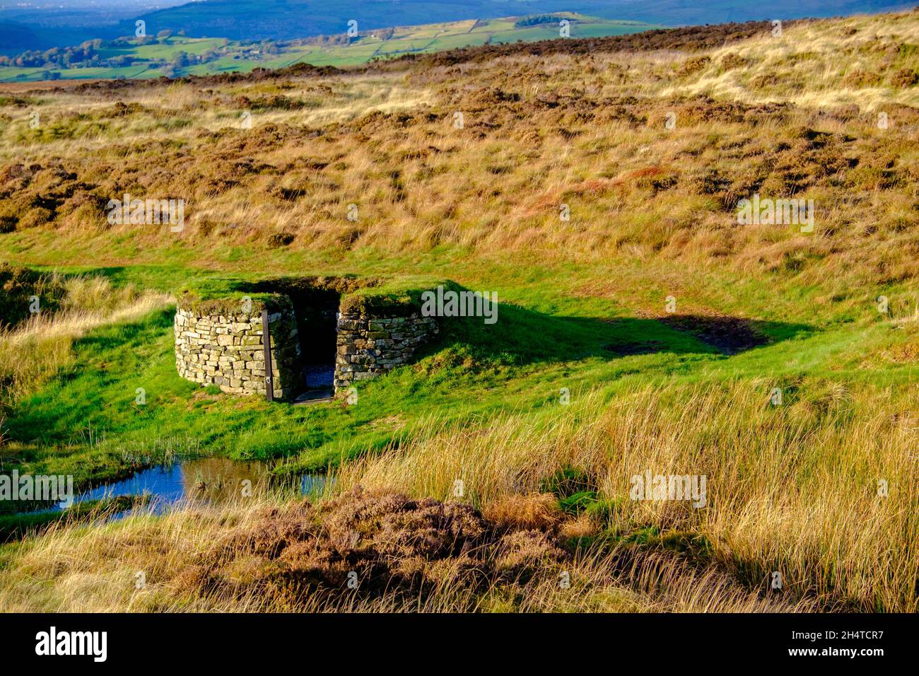 Grouse shooting butts on a Peak District moorland Stock Photo