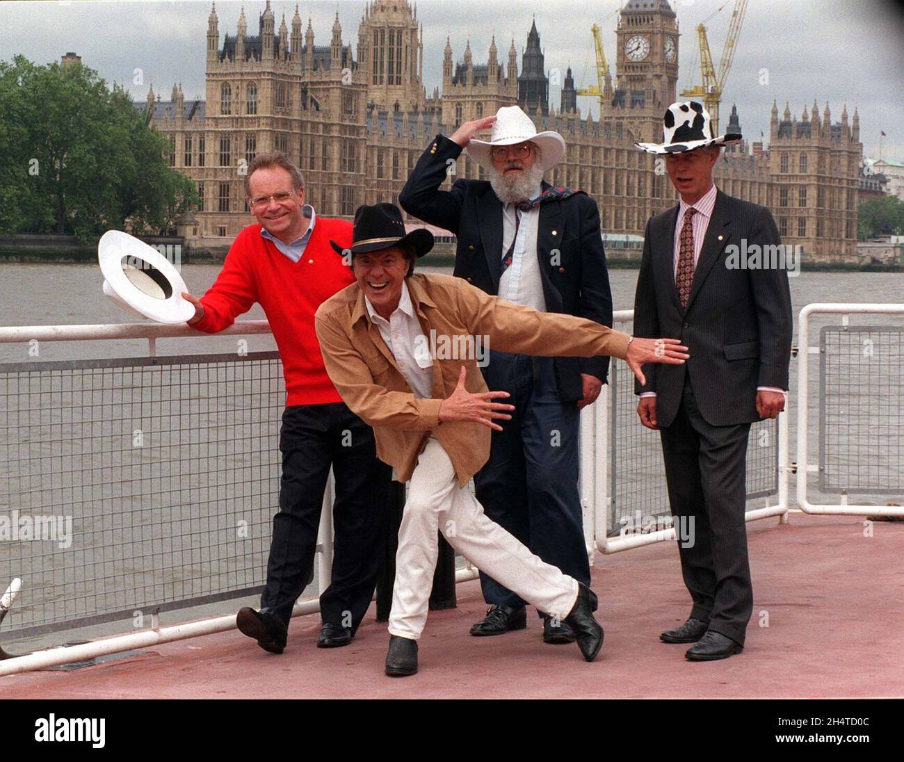 File photo dated 9/6/1998 of Lionel Blair (front) with Lord's (from left) Archer, Beaumont and Swifton, wear Stetson hats during a photocall on London's Lambeth Pier to launch the Help the Aged Longest Day Event. Showbiz veteran Blair has died aged 92, his agent has told the PA news agency. Issue date: Thursday November 4, 2021. Stock Photo