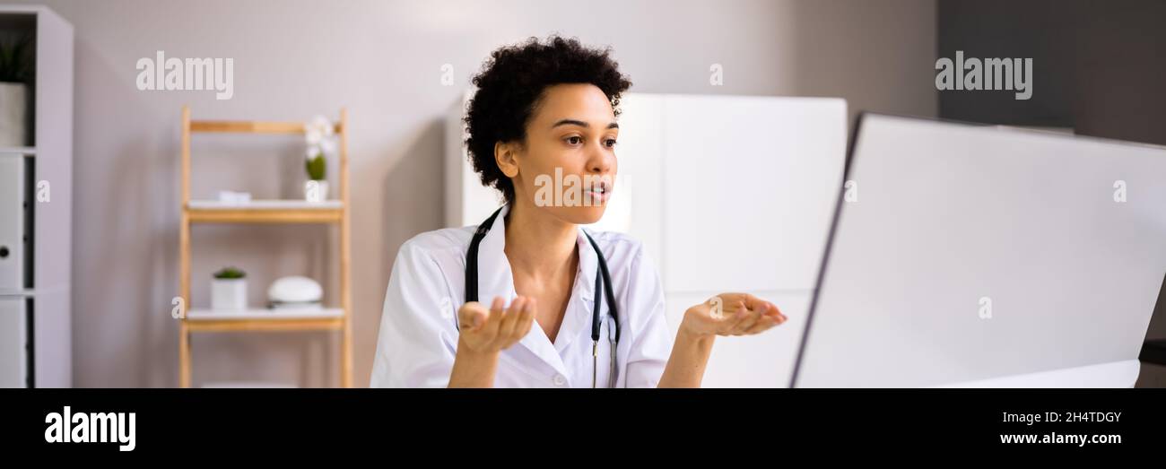 Professional African American Doctor Woman In Video Conference Stock Photo