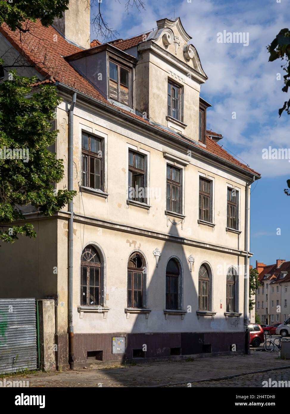 WROCLAW, POLAND July 5, 2021 An old tenement house with mansard roof