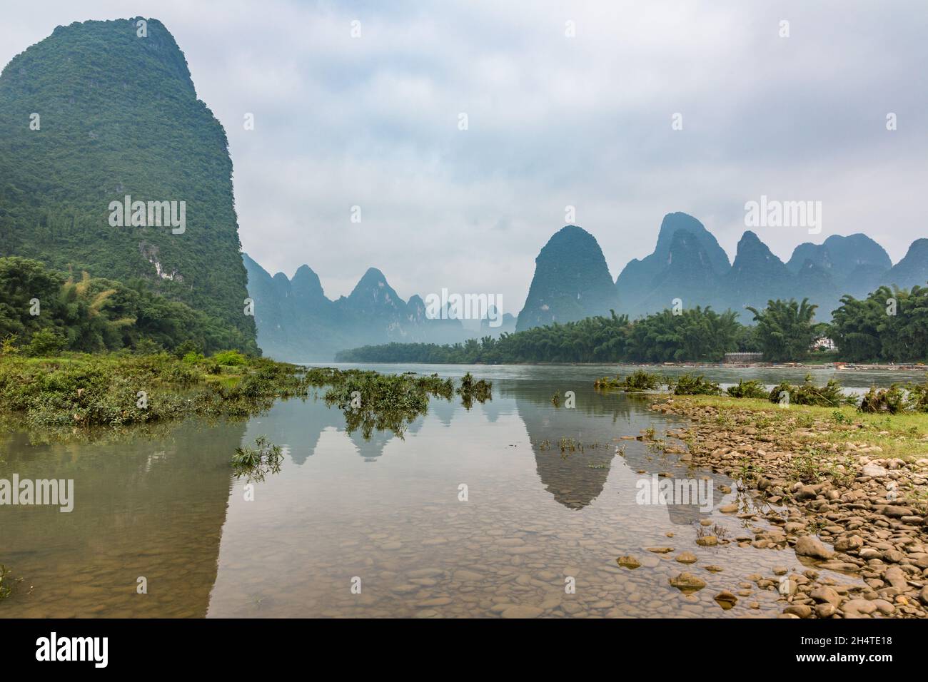 The Li River and limestone karsts near the scene pictured on the Chinese 20 yuan banknote.  Xingping, China. Stock Photo