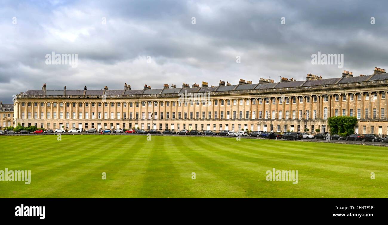 Bath, England - August 2021: The Royal Crescent in the city of Bath. It is an important example of Palladian architecture. Stock Photo