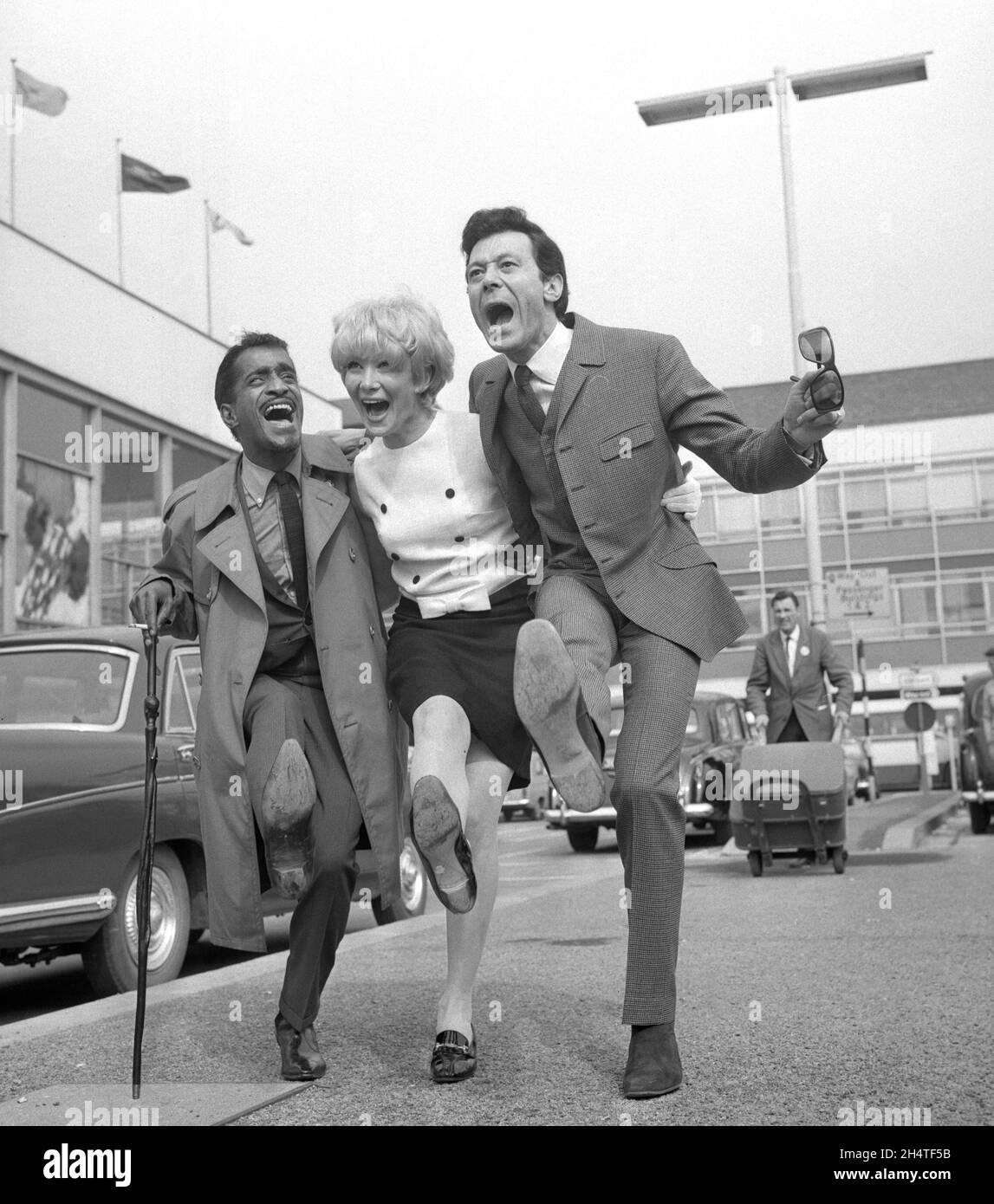 File photo dated 03/05 1966 of (left to right) Sammy Davis Jr, Joyce Blair and Lionel Blair at London Airport. Showbiz veteran Blair has died aged 92, his agent has told the PA news agency. Issue date: Thursday November 4, 2021. Stock Photo